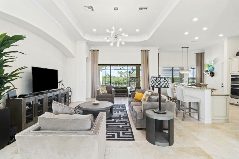 Waterfront living room photographed by Vuzario
